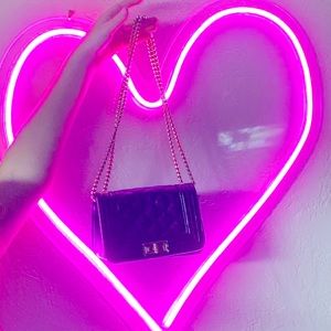 Black purse with red inside